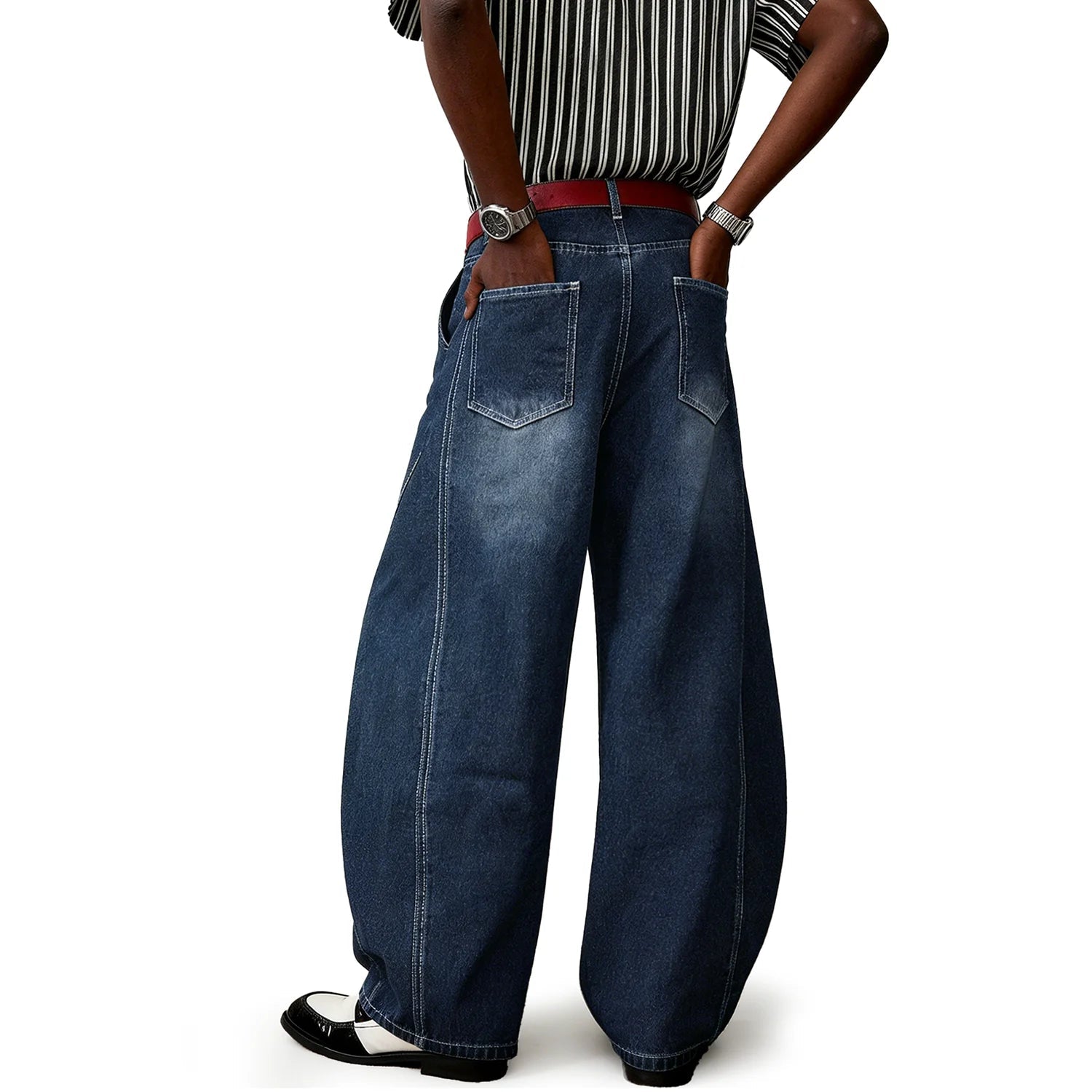 back view of person wearing blue splicing ultra baggy wide leg jeans.