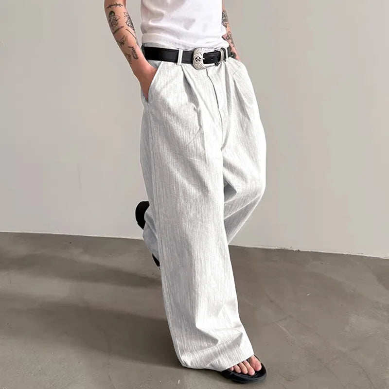 Pantalones anchos de un solo color con botones