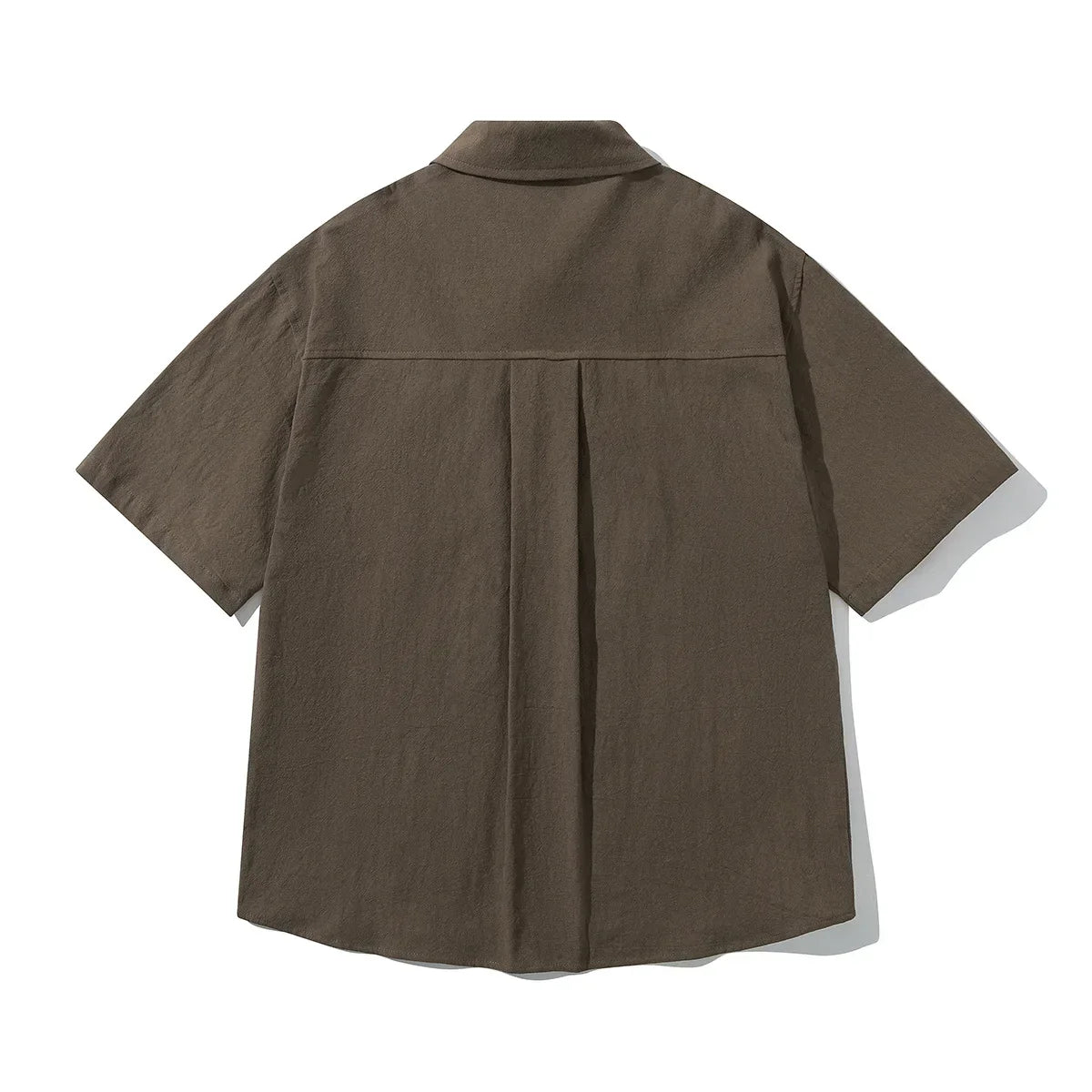 Camisa de algodón de manga corta con bolsillo delantero suelto