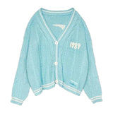 Grüner, bestickter Cardigan mit Knopfleiste