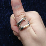 Anillo de manos haciendo signos