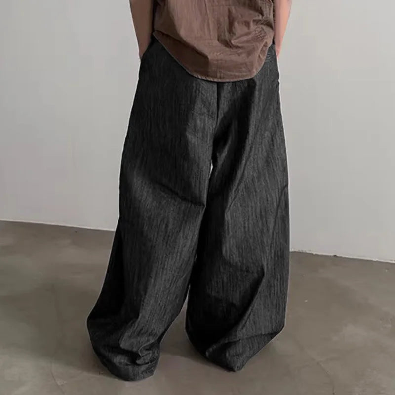 Pantalones anchos de un solo color con botones