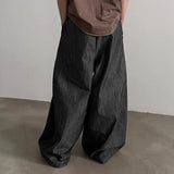 Pantalones anchos de un solo color con botones